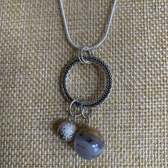 Elegant Silver Plated Necklace with Dual Charms of the Earth and Moon - Picture 3 of 6